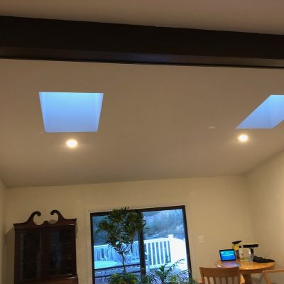 Skylights And Ceiling Lights In Living Room Interior Design