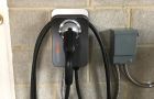 Ev Charging Station On Wall With Cables And Connection Box