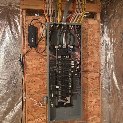 Electrical Panel With Wires And Breakers In Basement Setup