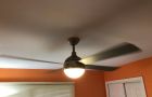 Ceiling Fan Lighting In Orange Room With Blinds And Doors