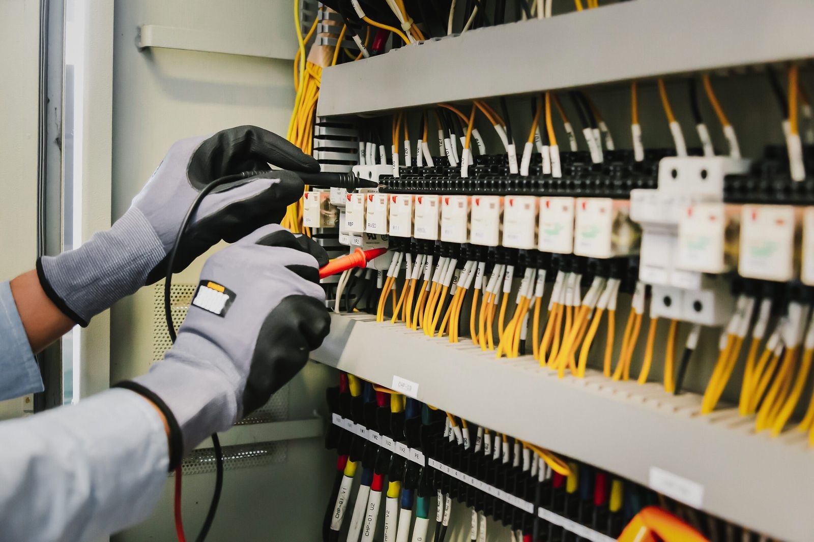 Hands Working On Electrical Control Panel With Wires And Tools Severn Md