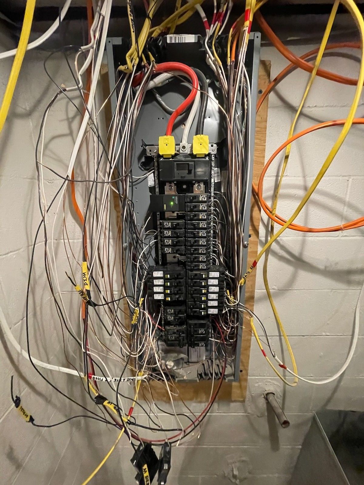 Electrical Panel With Multiple Wires And Breakers In Basement Odenton Md