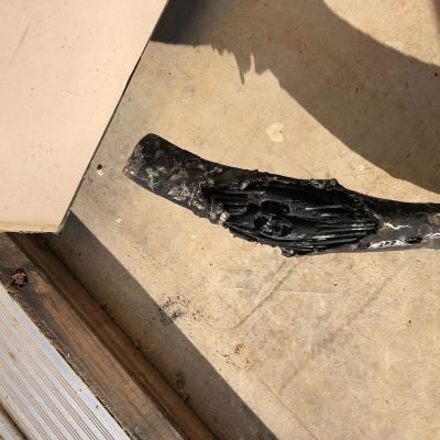 Burnt Hand Shape On Metal Surface Area Image