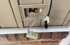 Damaged Wall Outlet With Wires And Broken Cover Plate