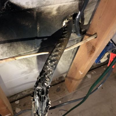 Burned Electric Cable In Wall With Smoke Damage