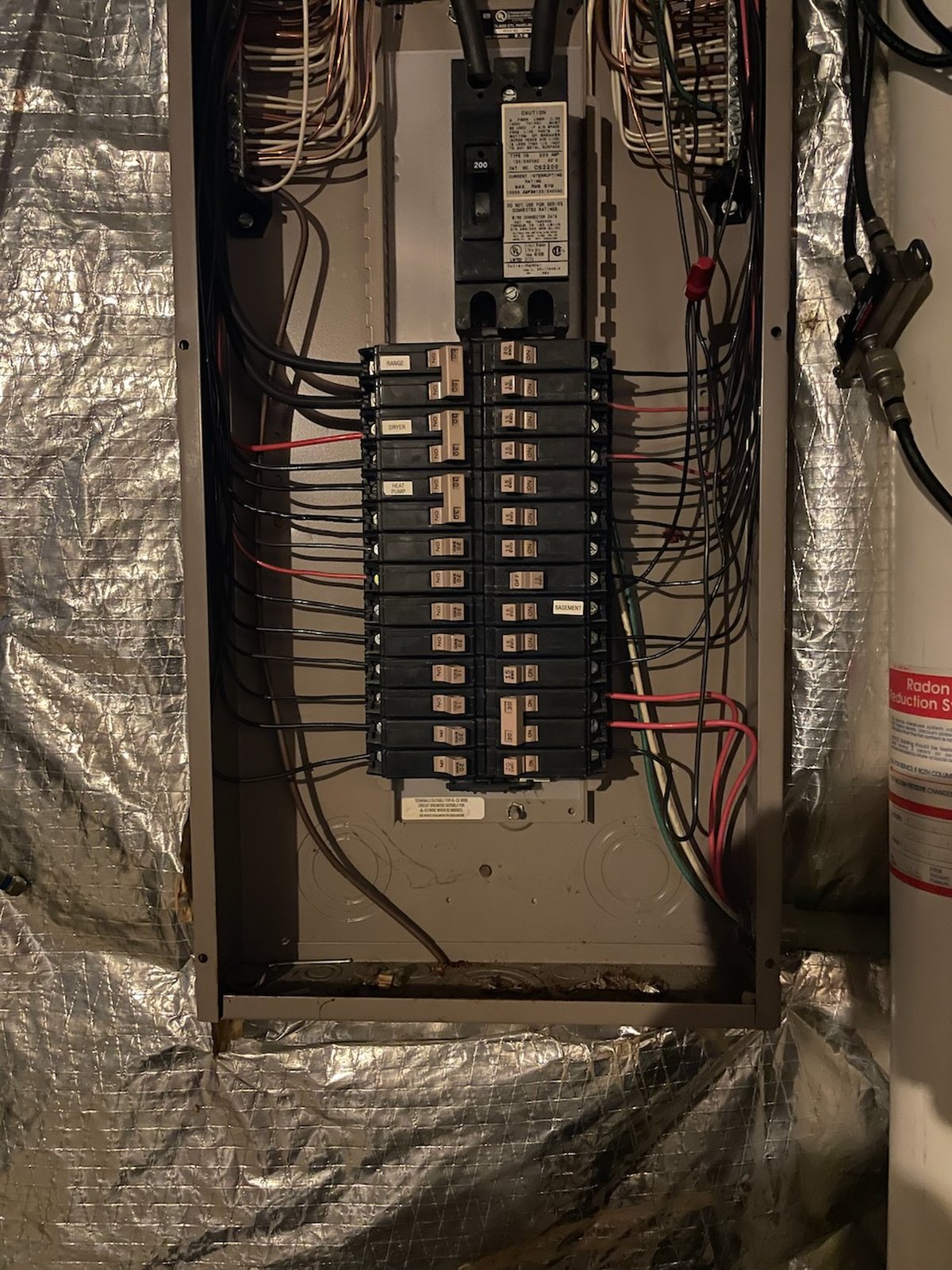 Breaker Panel In Basement With Wires And Insulation Glen Burnie Md