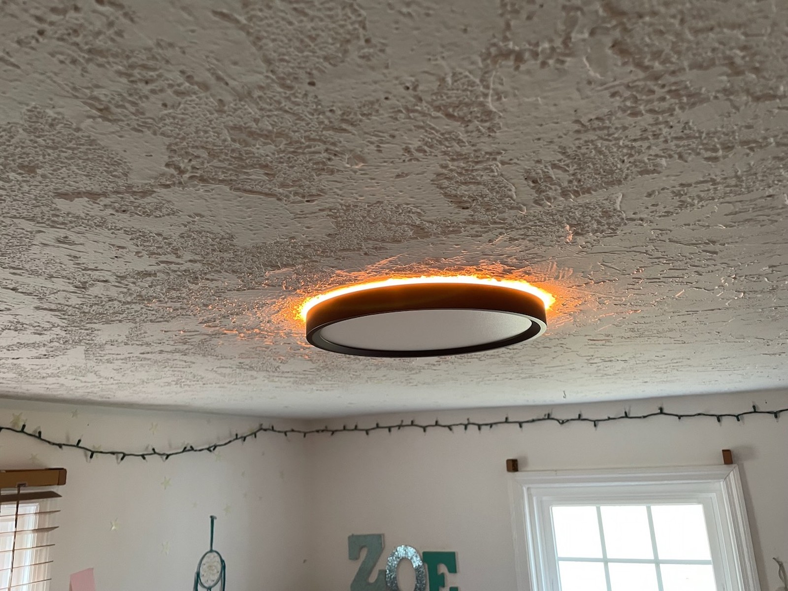 Ceiling Light Fixture With Orange Glow And Textured Surface Elkridge Md