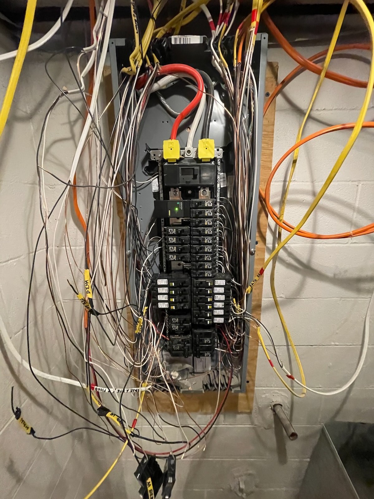 Electrical Panel With Multiple Wires And Breakers In Basement Odenton Md