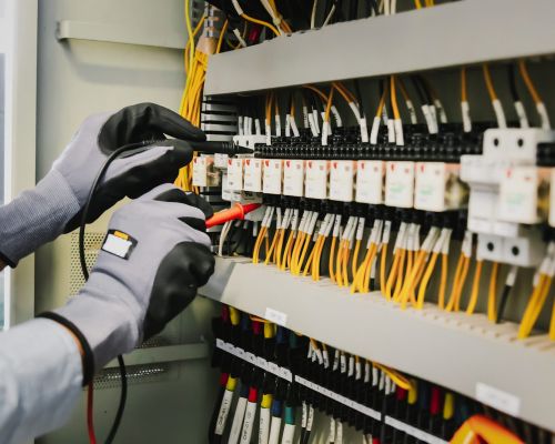 Hands Working On Electrical Control Panel With Wires And Tools Severn Md