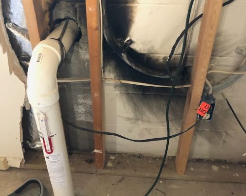Damaged Wall Pipe Wiring Blackened Area In Basement Crofton Md