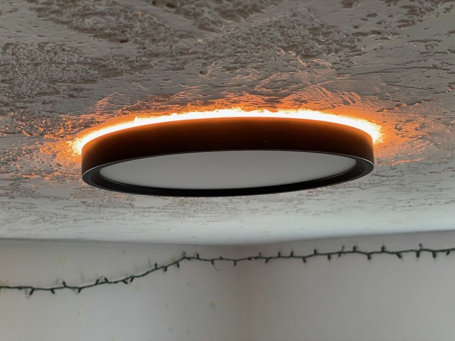 Circular Ceiling Light With Orange Accent Lighting