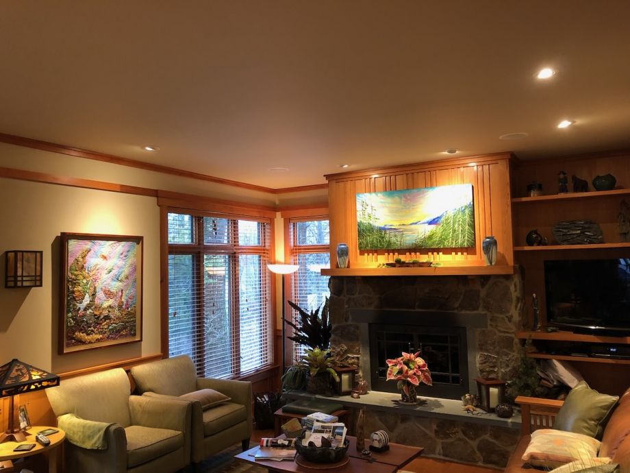 Living Room With Artwork And Cozy Furniture In Chalet Style