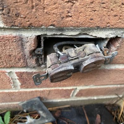 Outdoor Electrical Outlet Embedded In Brick Wall ‘damaged’