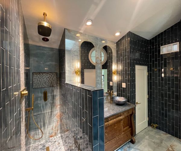 Modern Bathroom With Blue Tiles And Elegant Fixtures Crofton Md