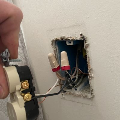 Electrical Outlet Wiring With New Receptacle Being Installed