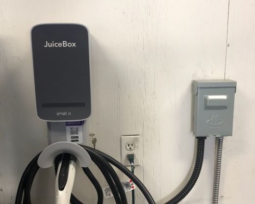 Juicebox Electric Vehicle Charger On Wall Outlet And Cable Severn Md